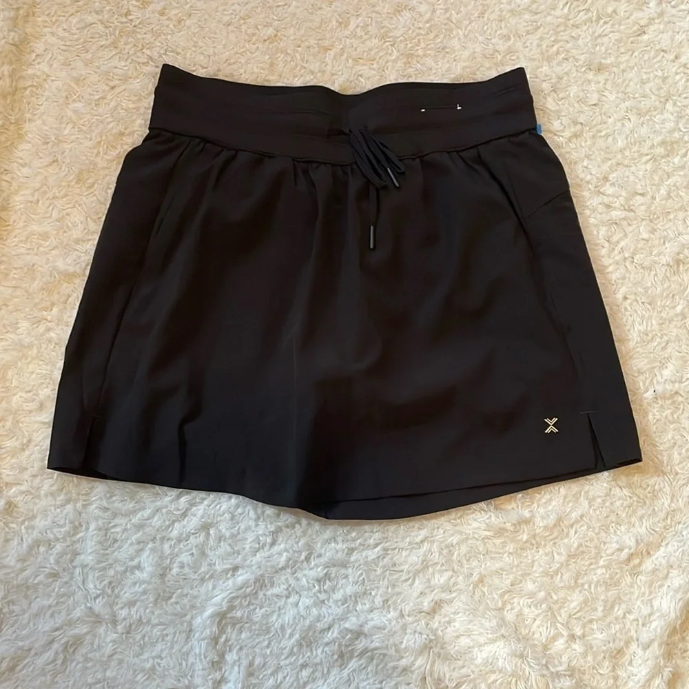 Xersion Black mini skirts and shorts